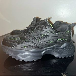These Shoes are from CUCCOO with black & green stripes on the front & inside.